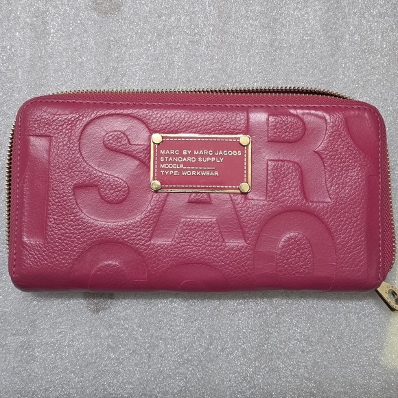 Marc By Marc Jacobs Handbags - Marc by Marc Jacobs Pink Embossed Zip-Around Wallet